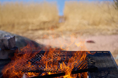 Close-up of bonfire on barbecue grill