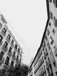 Low angle view of buildings against clear sky