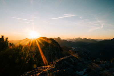 Scenic view of mountains against sky during sunset