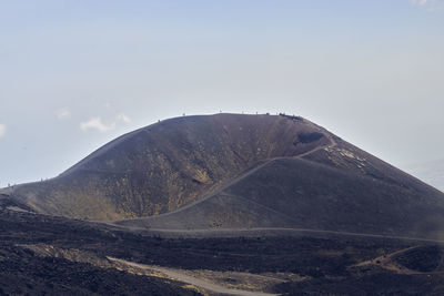 Scenic view of volcanic mountain against sky