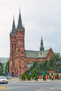 Buildings in city against sky