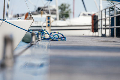 Close-up of boat moored at harbor