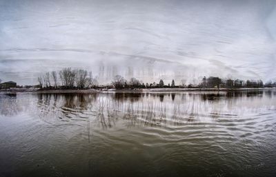 Scenic view of lake against sky