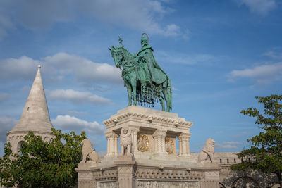 Low angle view of statue against sky