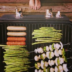 Hand holding vegetables at night