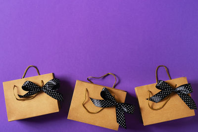 High angle view of heart shape on table against blue background
