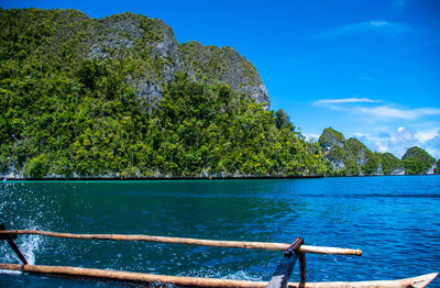 Scenic view of sea against blue sky