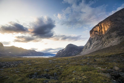 Alpenglow on mountain in akshayak pass, baffin island.