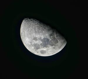 Low angle view of moon against sky at night