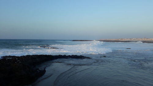 Scenic view of sea against clear sky