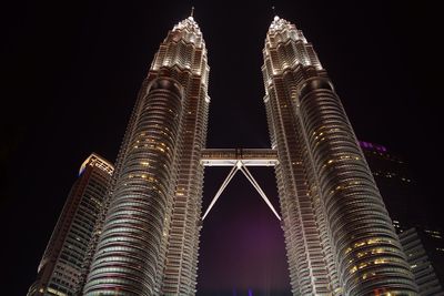 Low angle view of tower at night