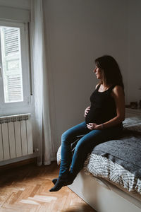 Pregnant woman resting at home