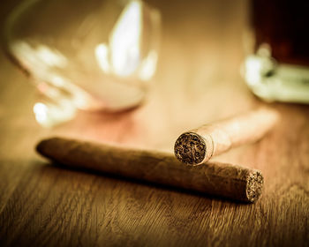 Close-up of tobacco products on table