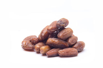 Close-up of roasted over white background