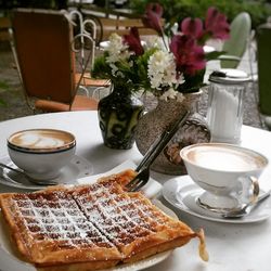 Close-up of breakfast served on table