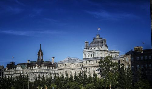 Low angle view of church against blue sky