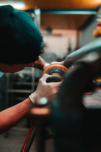 Polishing a cage for a car.