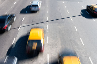 High angle view of cars moving on road