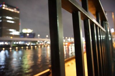 Reflection of illuminated buildings in water