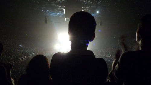 Rear view of man in nightclub