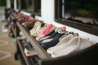 Close-up of shoes on rack