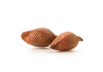 Close-up of strawberry against white background