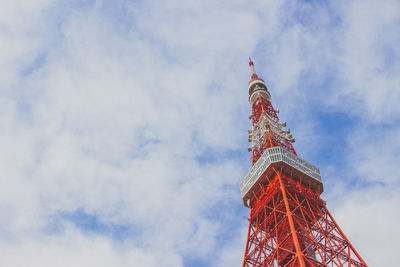 Low angle view of building against cloudy sky