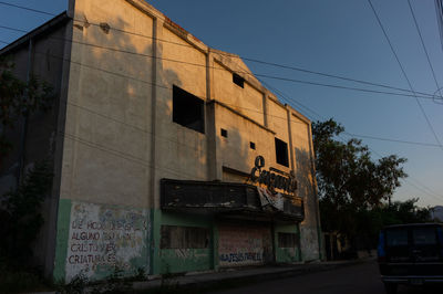 Low angle view of old building against sky