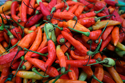 Close-up of red chili peppers for sale at market