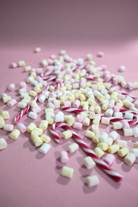 Close-up of multi colored candies on table