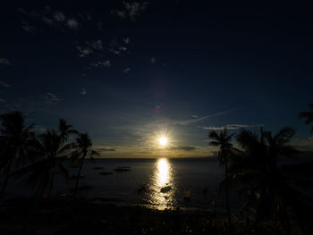 Scenic view of sea at sunset