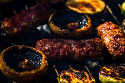 High angle view of meat on barbecue