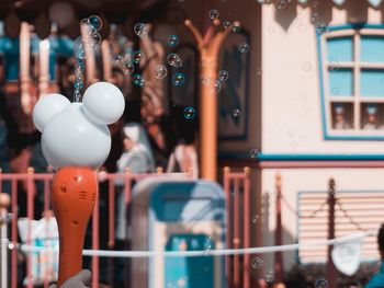 Close-up bubbles against built structure