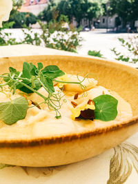 Close-up of leaves in plate on table