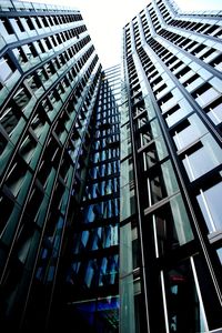 Low angle view of modern buildings against sky