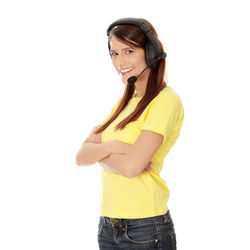 Young woman standing against white background