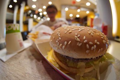 Close-up of burger on table in restaurant