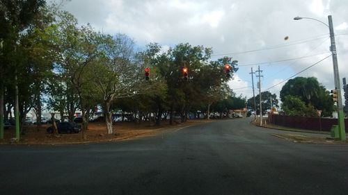 View of road against cloudy sky