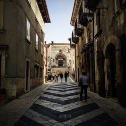 People in front of building