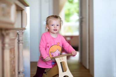 Close-up of girl playing at home