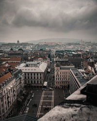 High angle view of city buildings against sky