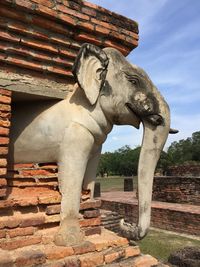 Low angle view of statue against the sky
