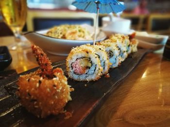 Close-up of sushi served on table