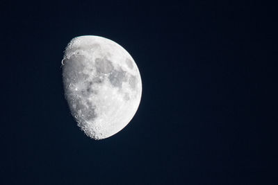 Close-up of moon against clear sky at night