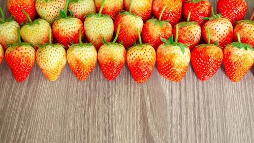 High angle view of strawberries on table