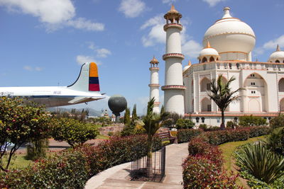 Replica of monument and airplane at park