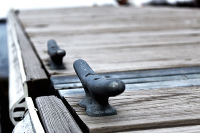 Close-up of sculpture on wooden bench