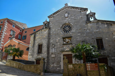 Low angle view of historic building against sky