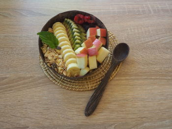 High angle view of fruits in plate on table