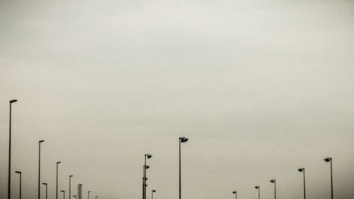 Low angle view of street light against sky